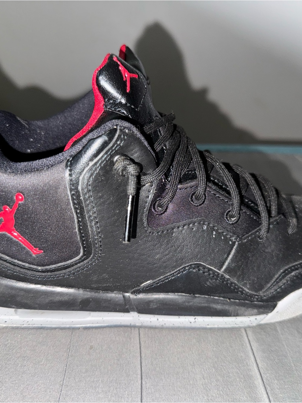 Jordan Kids Black Sneakers with Red Jumpman Accents